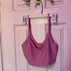 A set of two bras One pink one flower